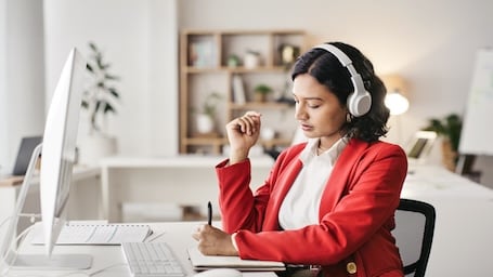 A small business owner reviewing her financials