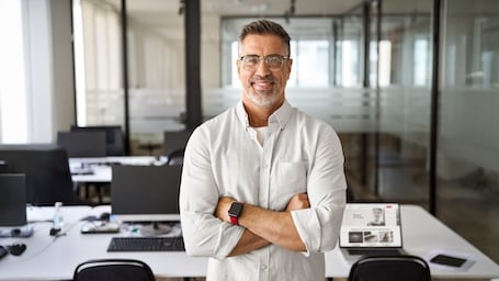 A Hiscox employee in the office