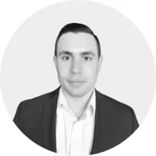 Black and white headshot of Chad Brucker