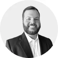 Black and white headshot of Josh Brown
