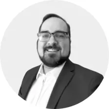 Black and white headshot of Nicholas Rispoli-Gomez