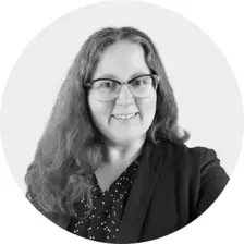 Black and white headshot of Nicole Coster