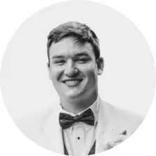 Black and white headshot of Ryan Polk