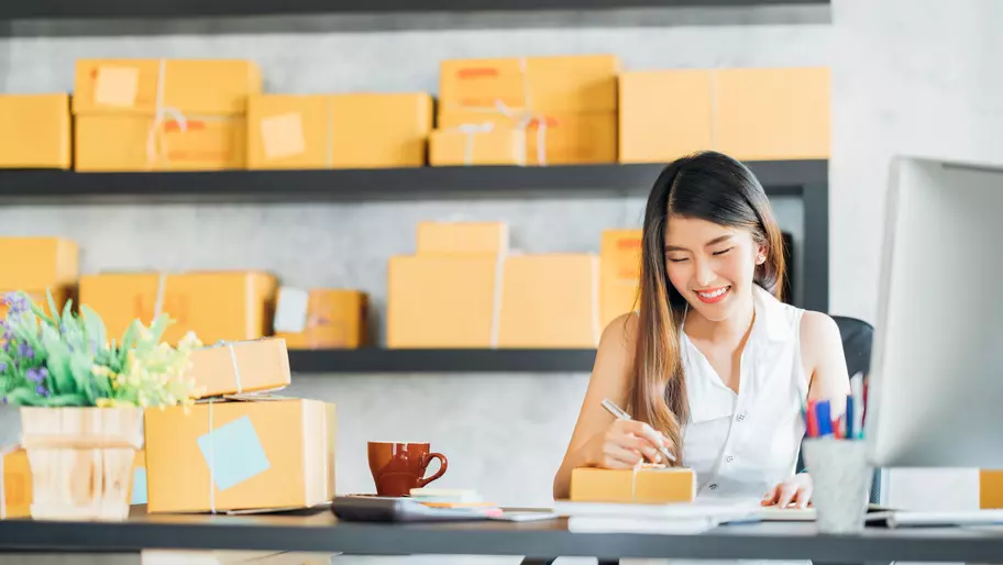 small business consultant works in her online business which has insurance 