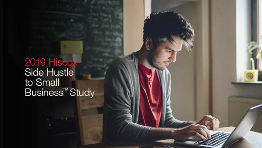 Younger man on computer