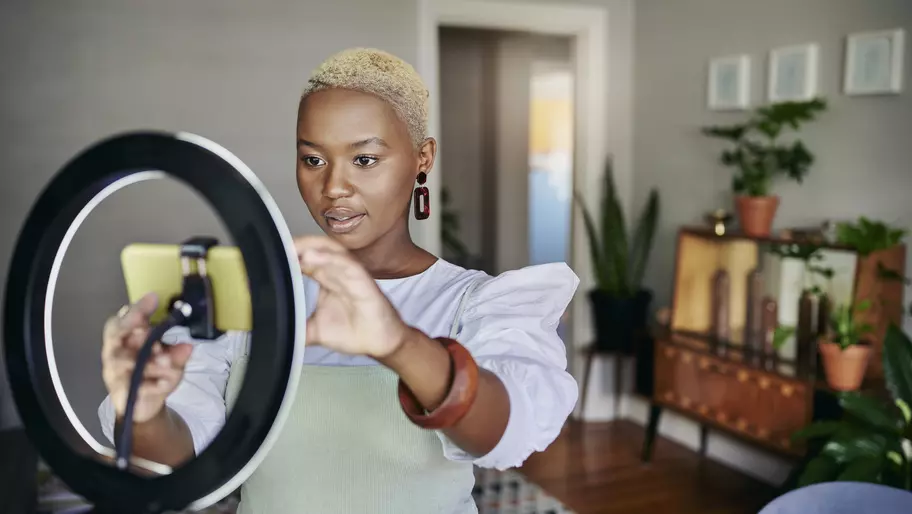 Woman filming for youtube