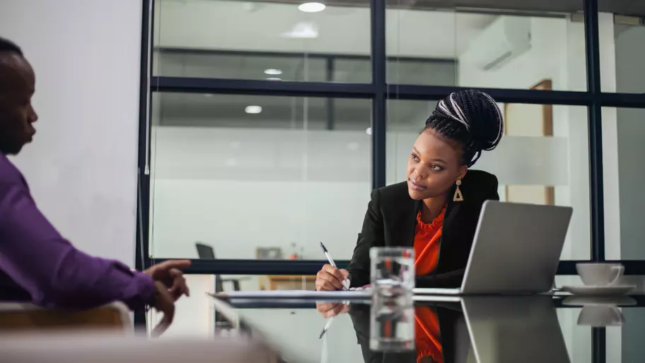 Female small business owner interviews potential male employee