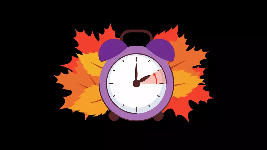 black background with orange and red leaves surrounding a clock falling back an hour to mark end of daylight saving time