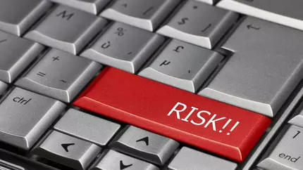 keyboard with a red risk button replacing the enter key