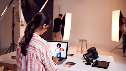 Photographer sets up lights