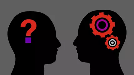 Illustration of two heads facing each other with question mark icon and gear icon. Unconscious bias training for small business.