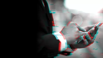 Businessman holding smart phone. Image glitch. Cyber attack.