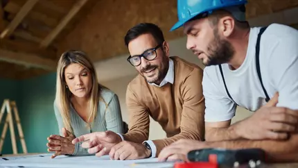 Contractors reviewing job plans with confidence knowing they're protected with PL and GL coverage