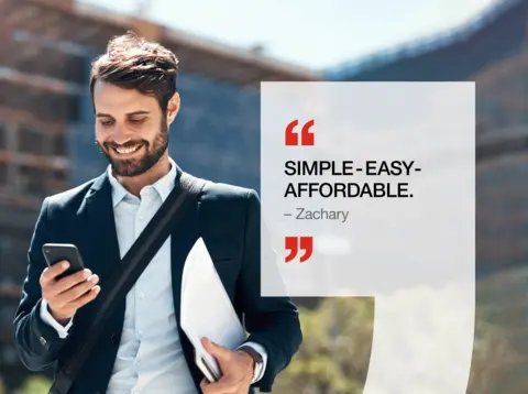 Man smiles while looking at his phone. Quote: "SIMPLE-EASY-AFFORDABLE. - Zachary"